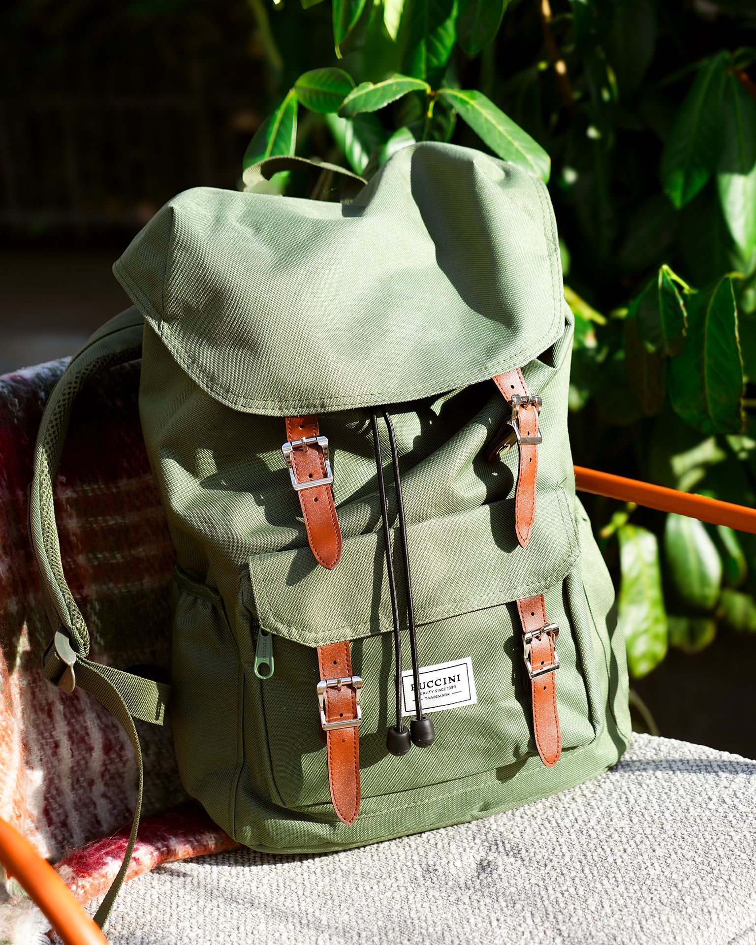 Зелений тканинний рюкзак з кишенями 