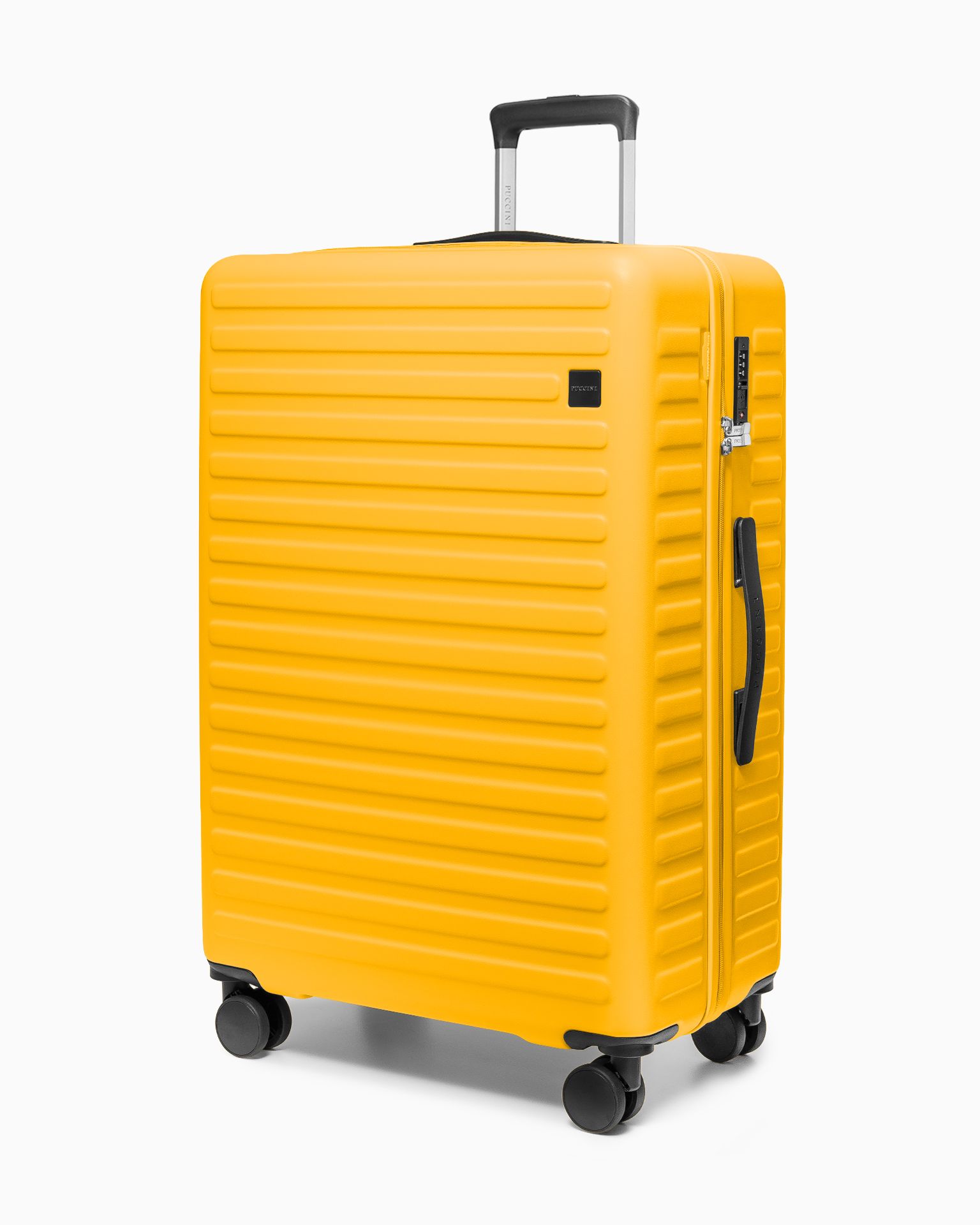 Велика валіза з полікарбонатними колесами жовтого кольору