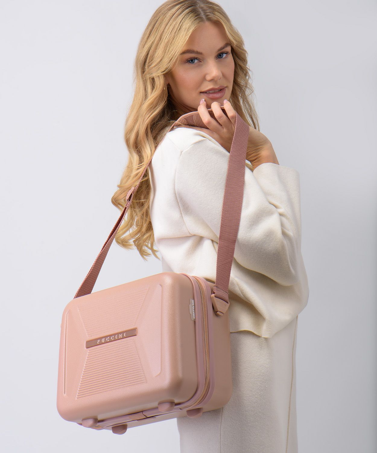 Дорожня сумка рожева з елементами рожевого золота