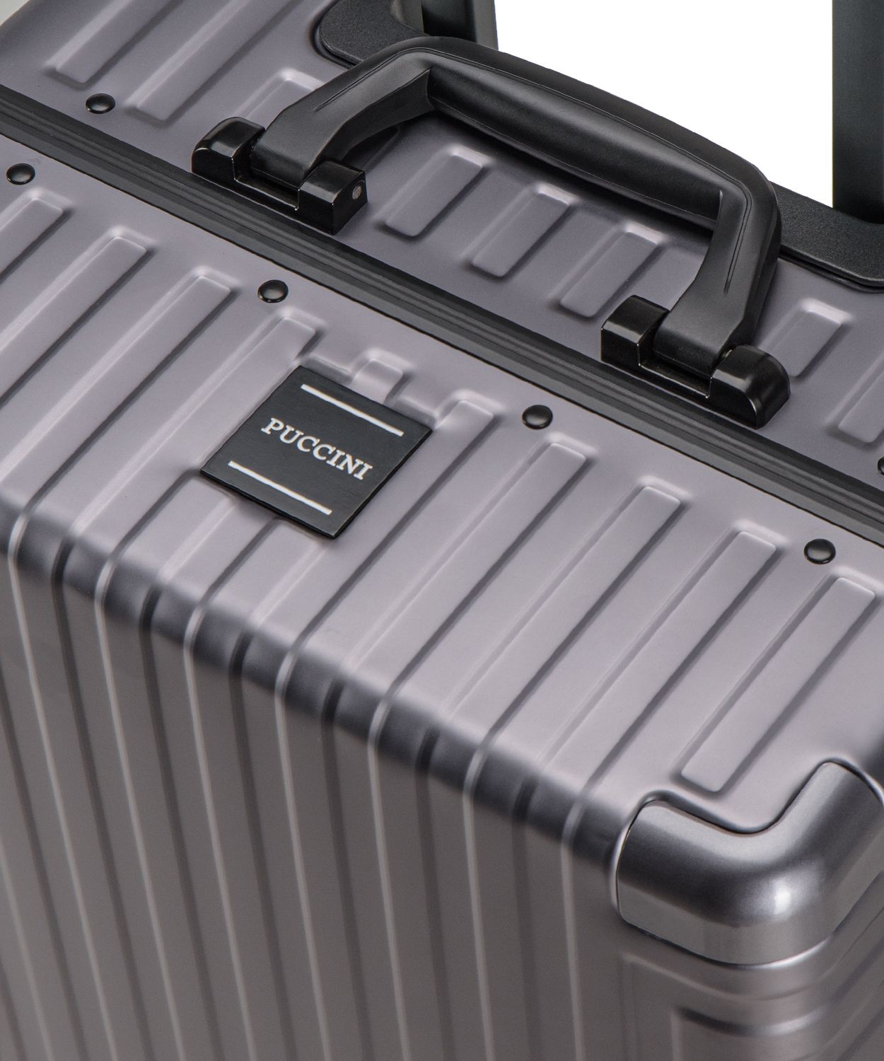 Сіра алюмінієва валіза на колесах